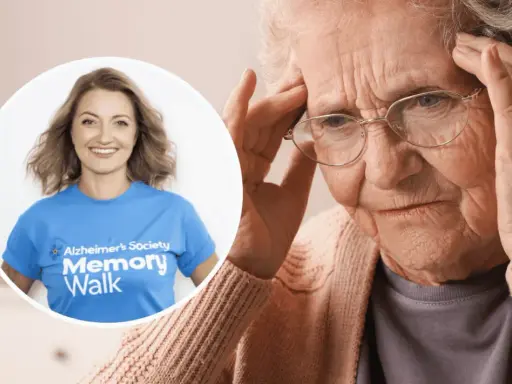 Kobieta z bólem głowy, być może objawy alzheimera. Obok uśmiechnięta wolontariuszka Alzheimer's Society Memory Walk.